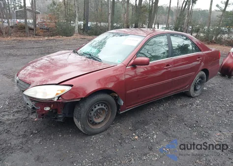 2002 Toyota Camry Le z USA, uszkodzony, nr VIN 4T1BE32K52U031844
